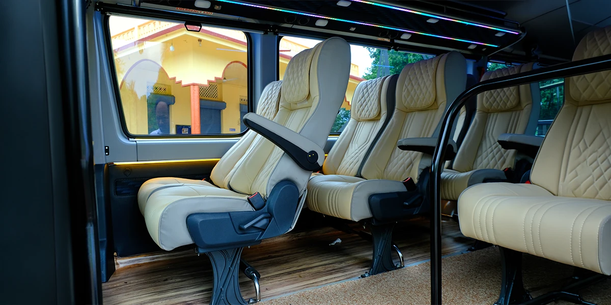 Comfortable reclining leather seats inside KJ Travels luxury minibus
